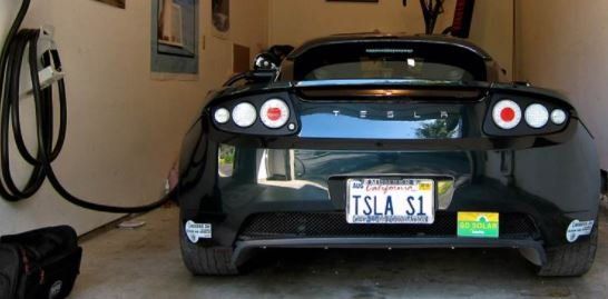 Tesla Car Charging Inside The Garage — Silver Lake, OH — Anything Electric LLC