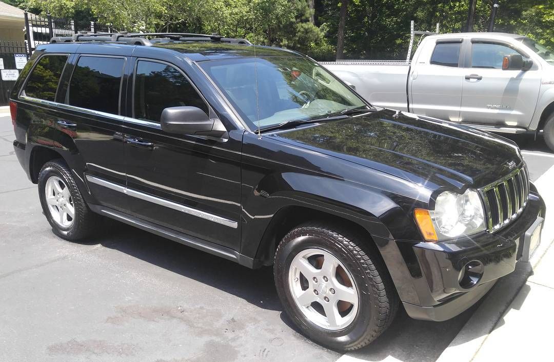 Black Jeep SUV cleaned and waxed during mobile detailing service