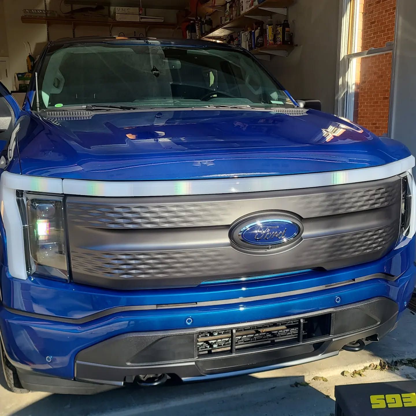 Blue Ford truck front view after mobile detailing service