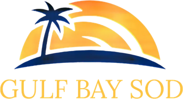 Logo for Gulf Bay Sod: palm tree on dark blue land with yellow and orange sunset backdrop.
