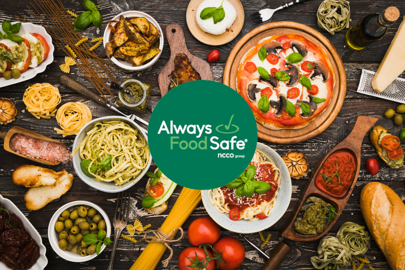 A table topped with a variety of food including pizza and pasta.