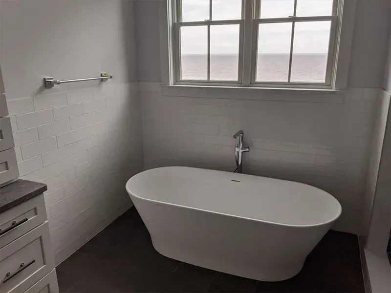 Dark flooring complements the neutral color scheme.