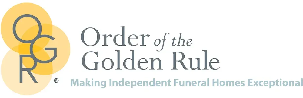 Logo: Funeral Directors Association of Kentucky. Green mountain range graphic, blue text.