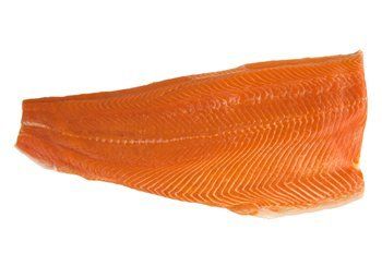Salmon fillet, bright orange, showing texture.