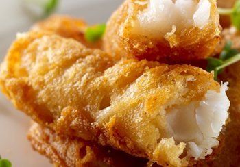 Golden fried fish fillets, crispy batter, flaky white fish inside.