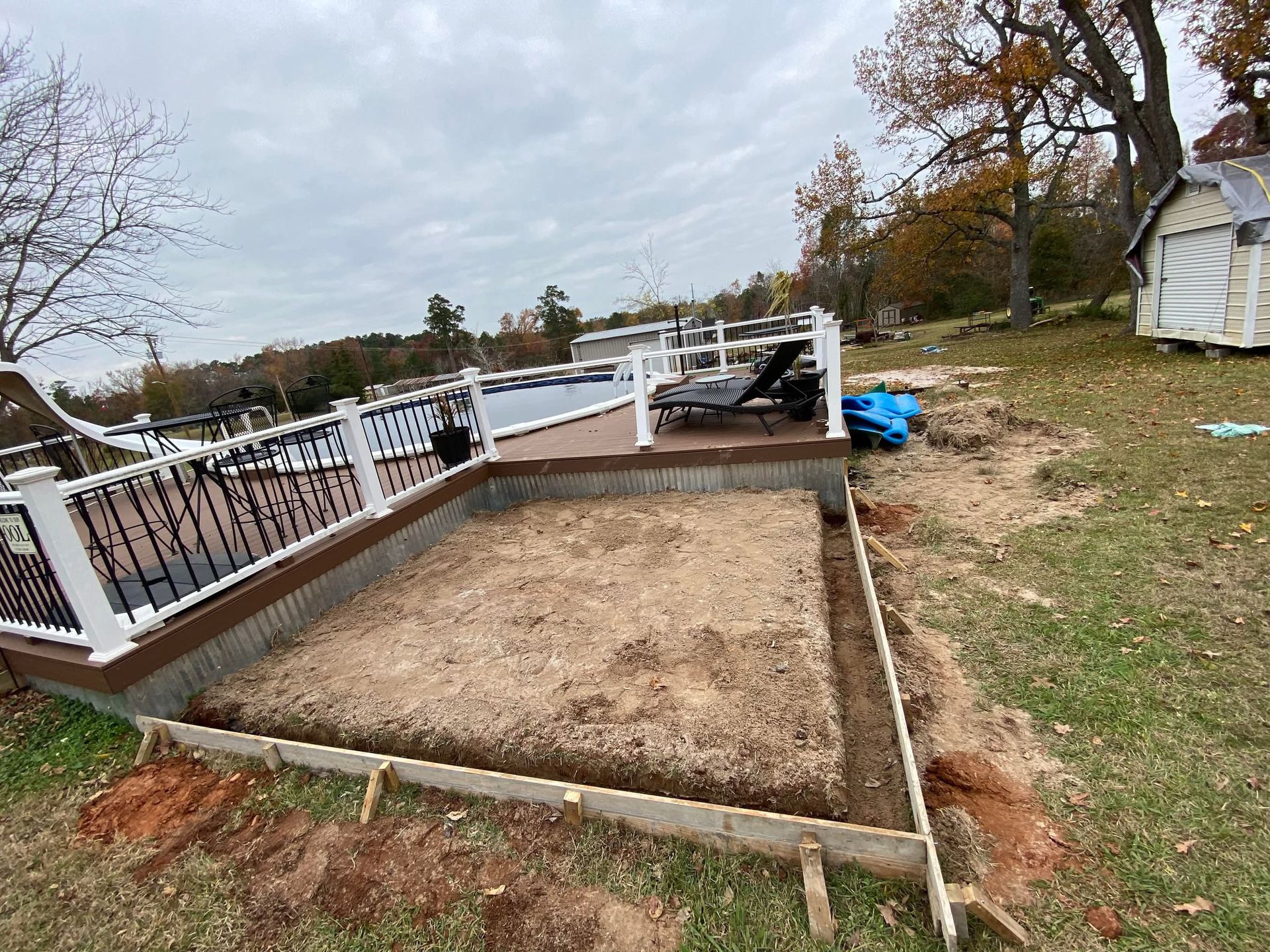 A deck is being built next to a body of water.