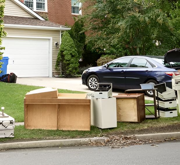 A Blue Car Is Parked In Front Of A House — Easy Flow Removals In Port Macquarie, NSW