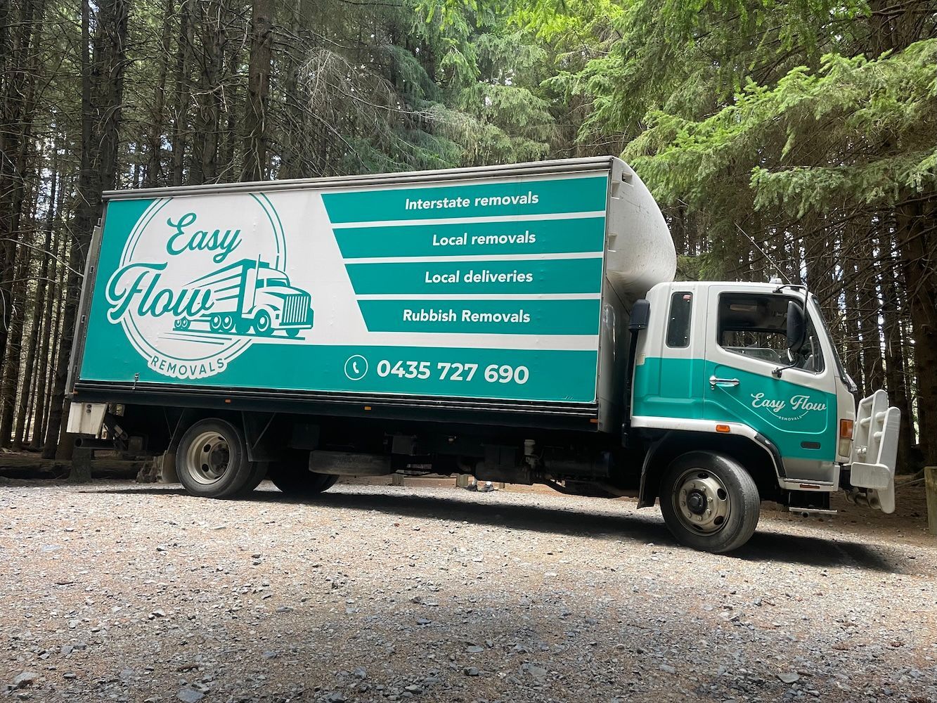 Removalist truck parked on a dirt road after a recent move in South West Rocks
