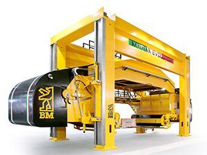 A yellow and black machine with the word bm on it