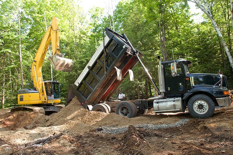 Unloading Soil of Truck and Excavator | Athens, GA | Watson Trucking