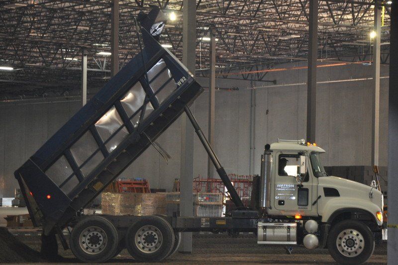 Truck Unloading Sand | Athens, GA | Watson Trucking