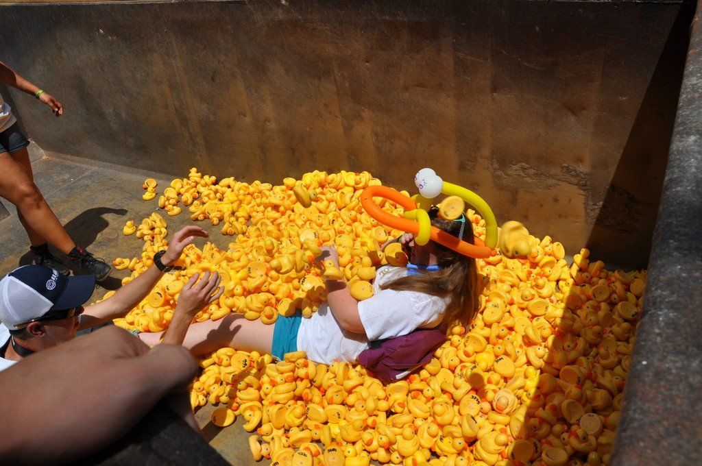 Woman Lying on Ducks | Athens, GA | Watson Trucking