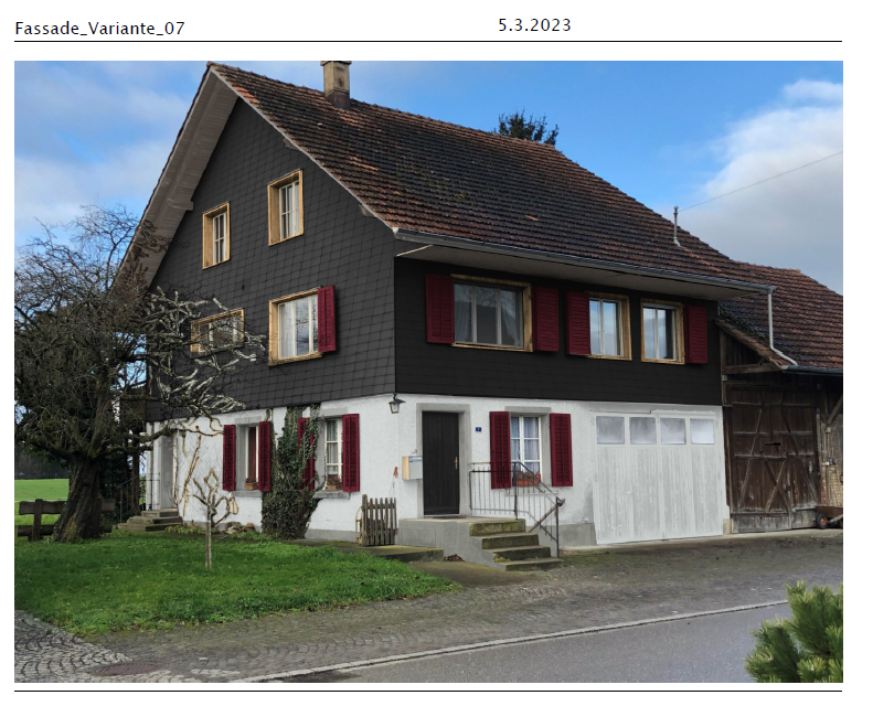 Ein Bild von einem Haus mit roten Fensterläden