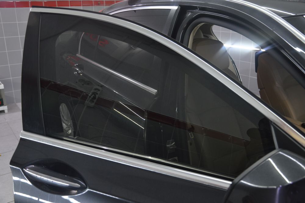 A Close Up Of A Car With The Door Open — Advanced Windscreens & Service Centre In Cannonvale, QLD