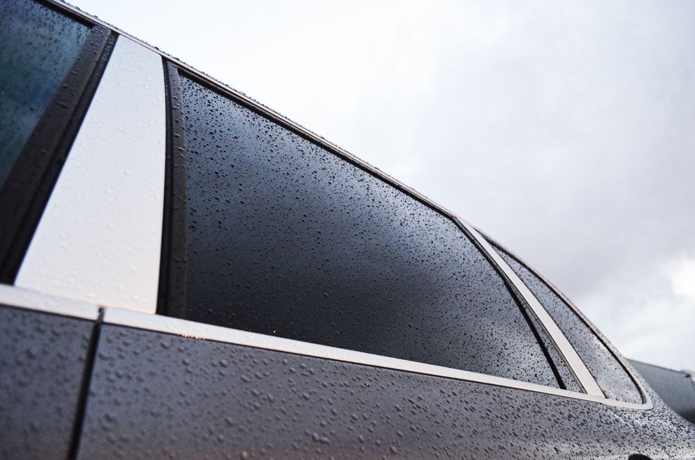 A Close Up Of A Car With Rain Drops On It — Advanced Windscreens & Service Centre In Proserpine, QLD