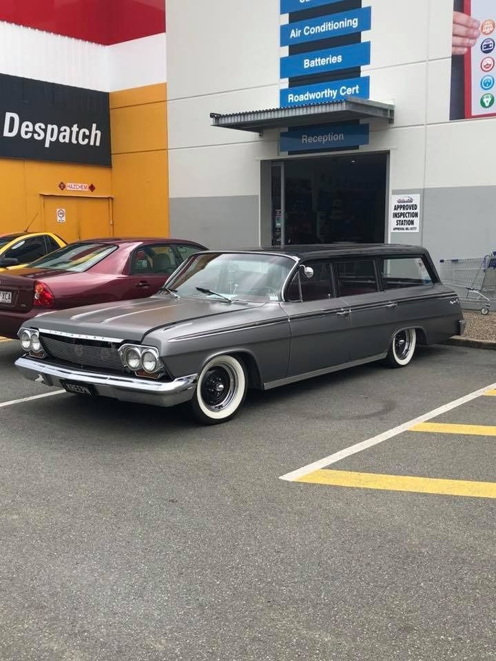 A Gray Car Is Parked In A Parking Lot In Front Of A Dispatch Store — Advanced Windscreens & Service Centre In Proserpine, QLD