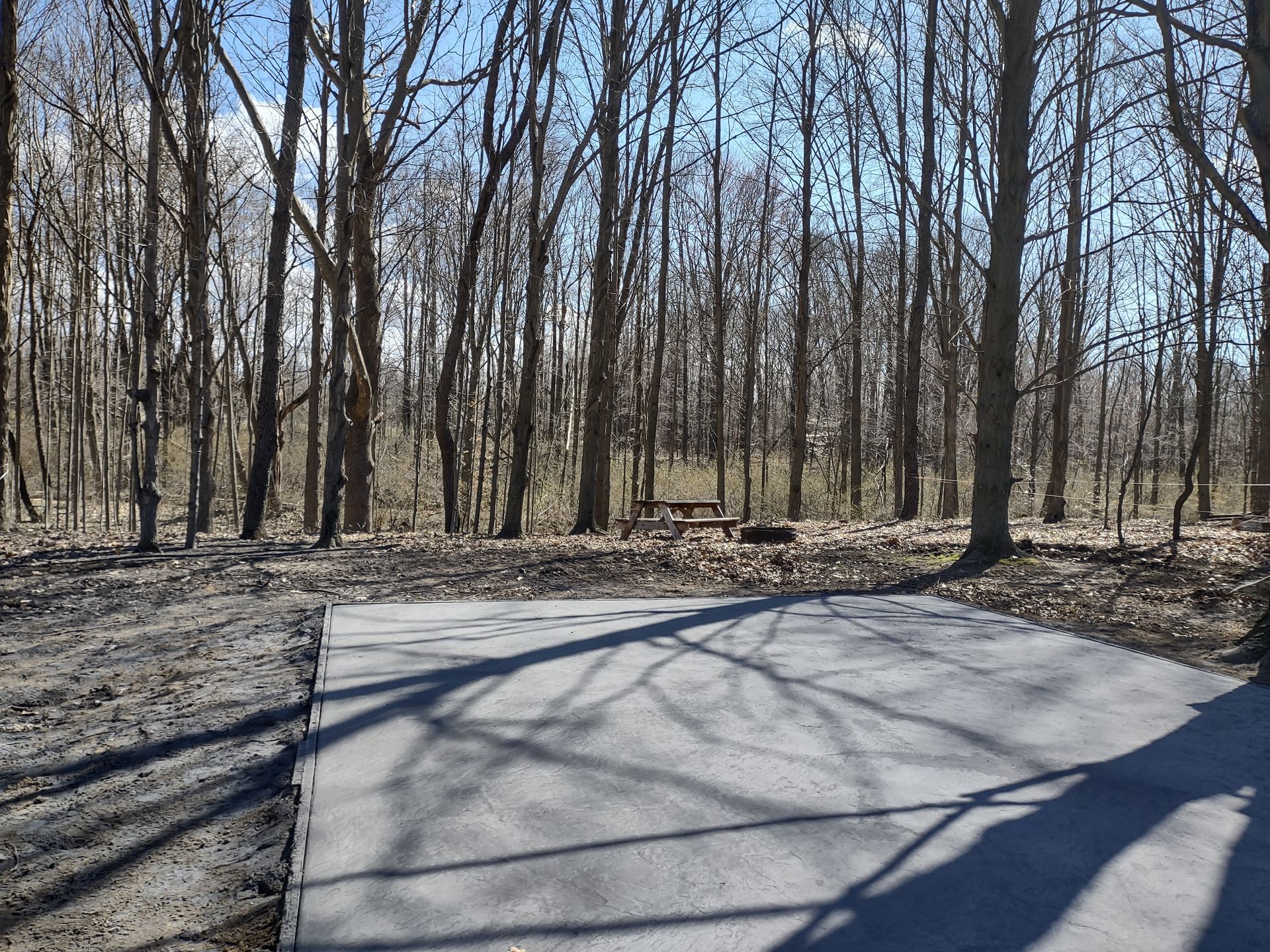 Stamped concrete pad being poured for glamping tents.
