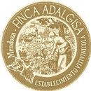 Circular wine label: Finca Adalgisa, Mendoza. Woman harvesting grapes with village in background.