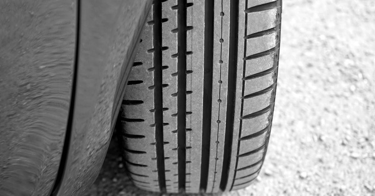 A close up of a car tire on a gravel road.  | McInerney Auto Center