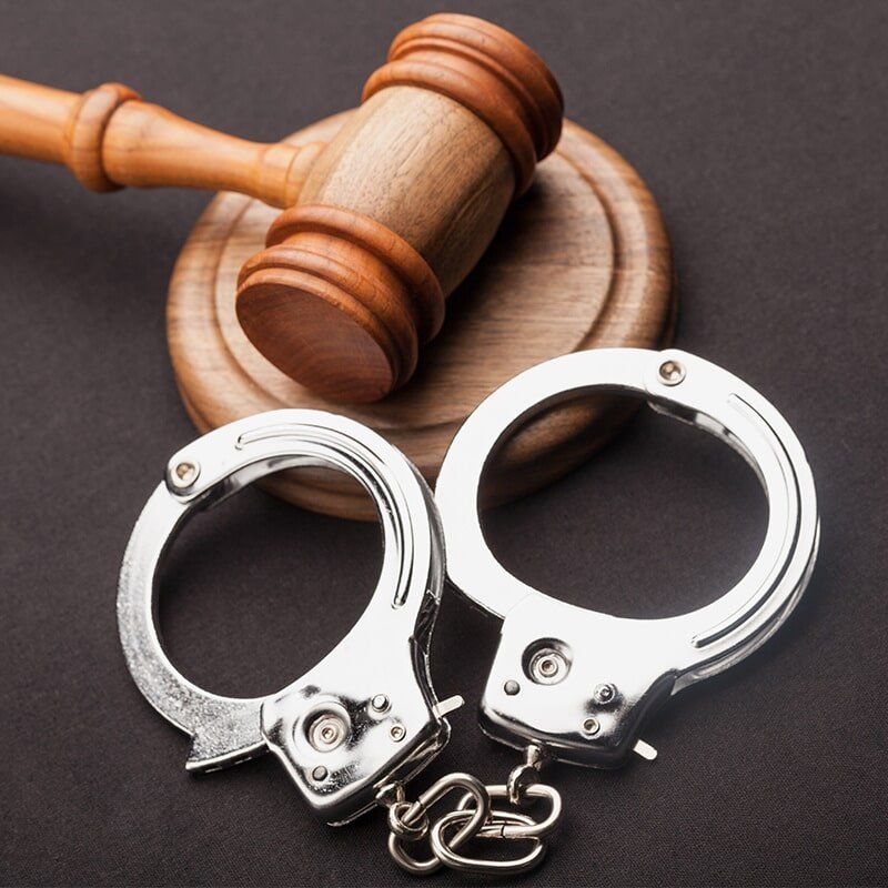 Handcuffs and Gavel — Anderson Telford Lawyers in Townsville, QLD
