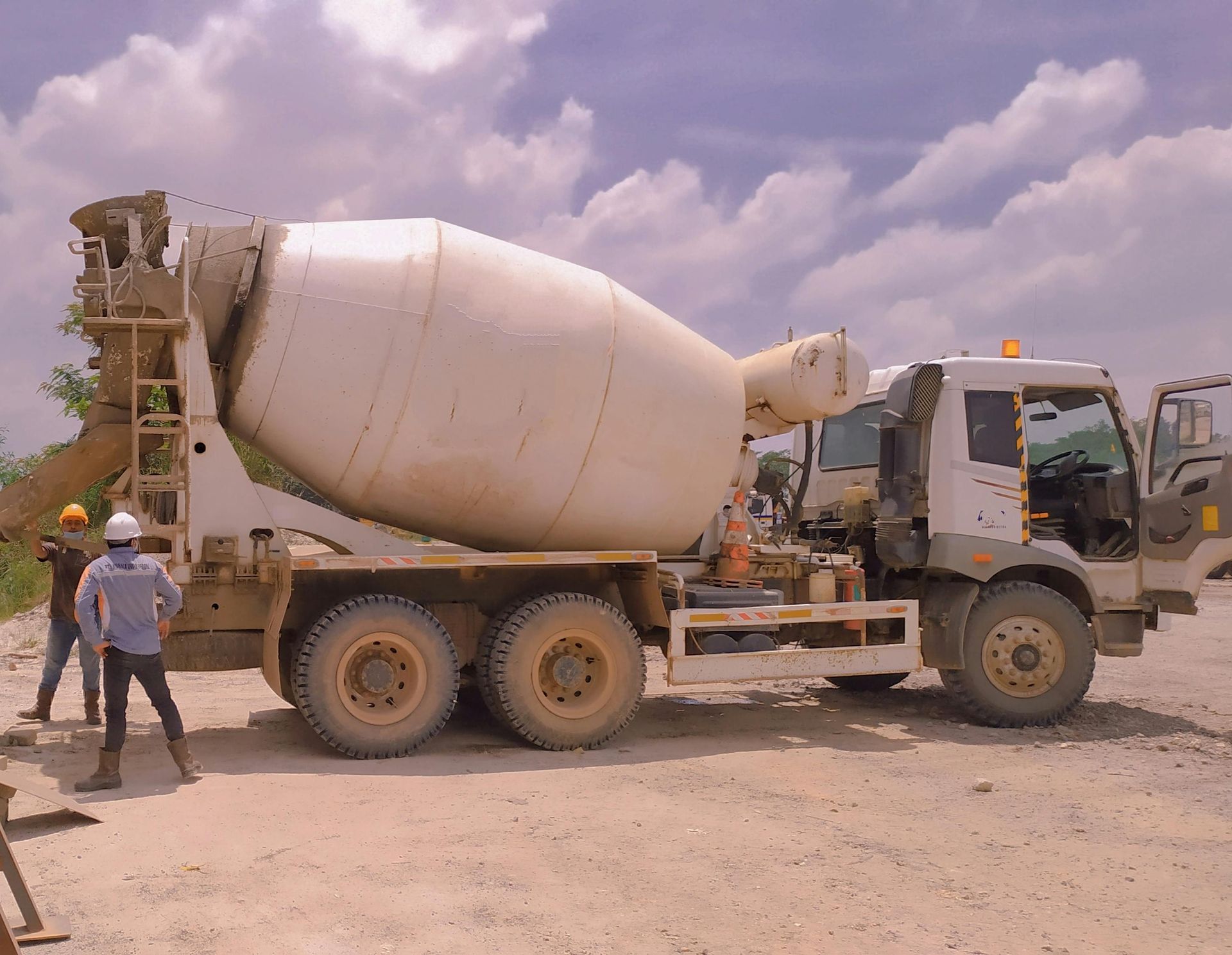 Concrete mixer truck on a Lethbridge home site.