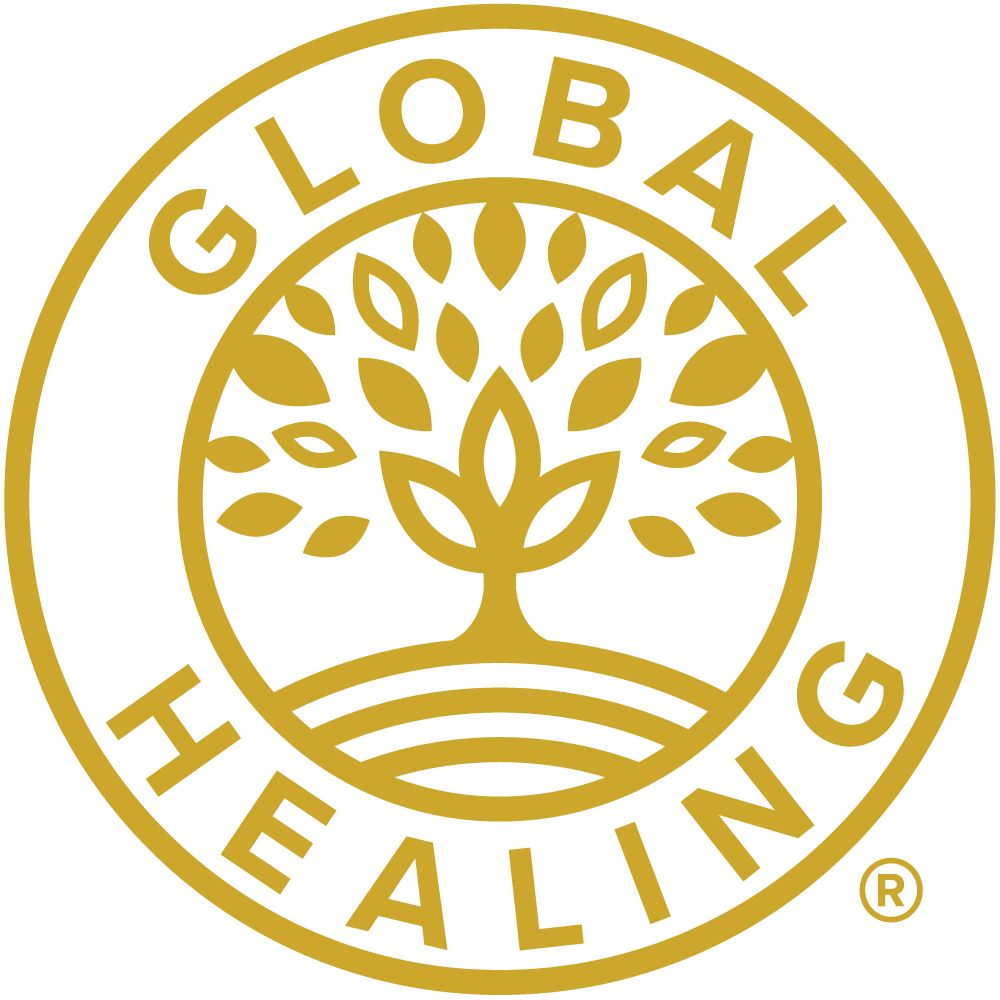 A gold logo for global healing with a tree in the center