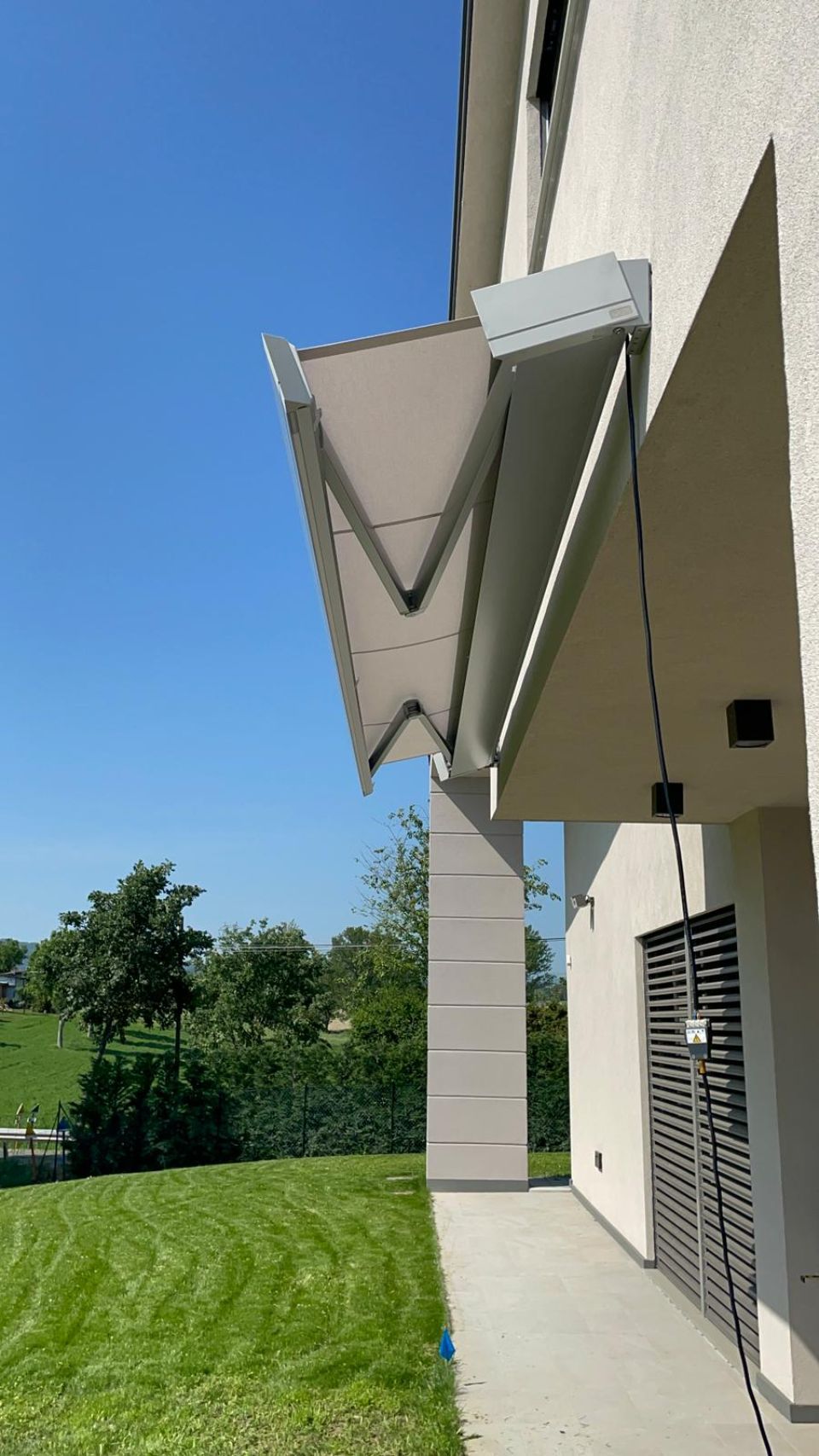 tenda da sole orizzontale a bracci retrattili