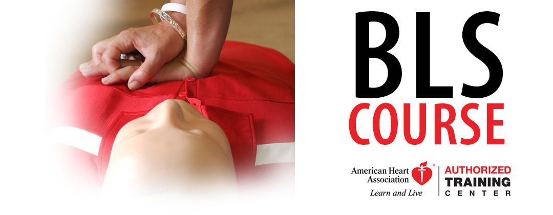 Person performing CPR on a mannequin during a BLS (Basic Life Support) course.