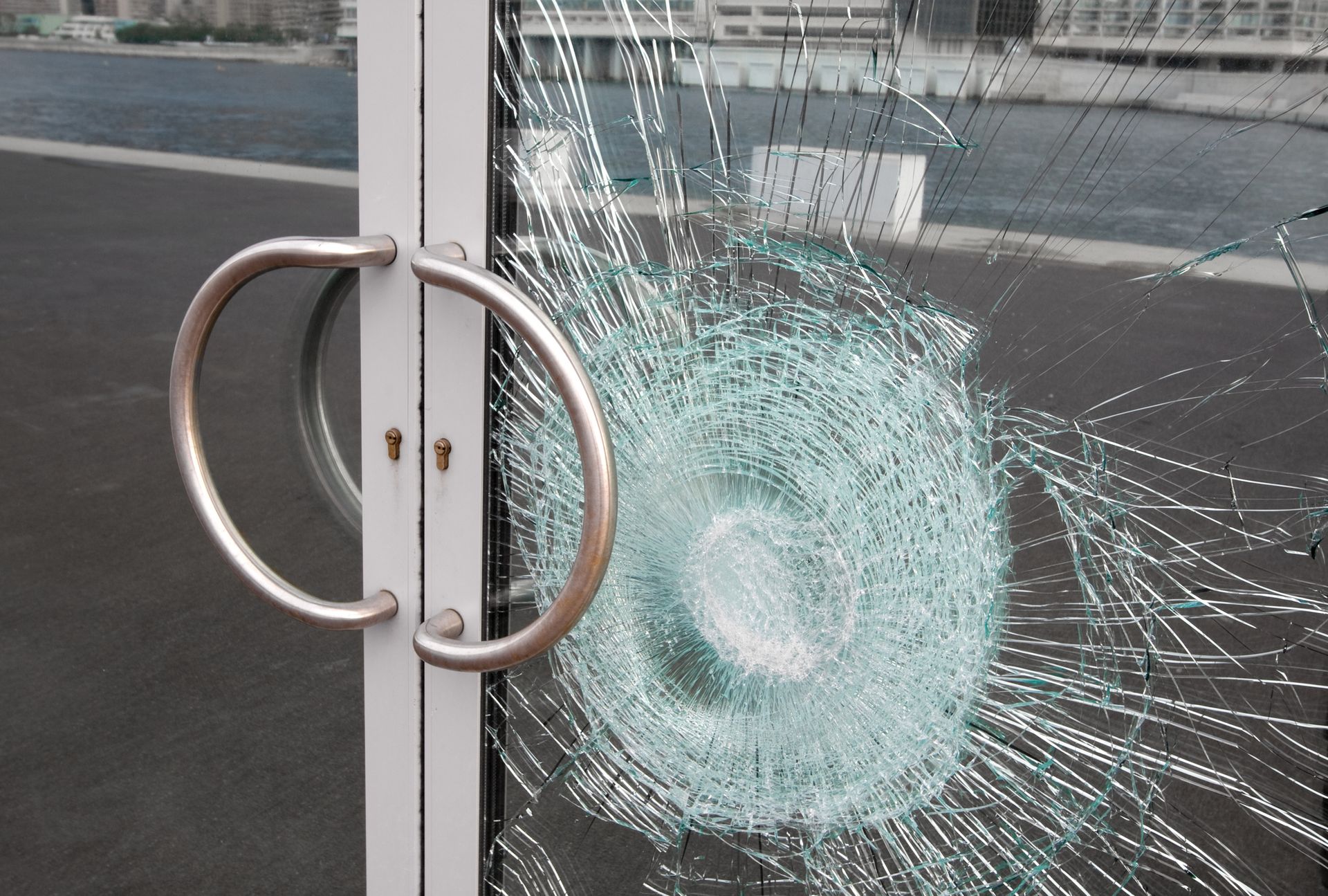 Broken window on business glass door.