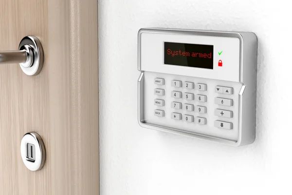 A door with a keypad on it next to a door handle.