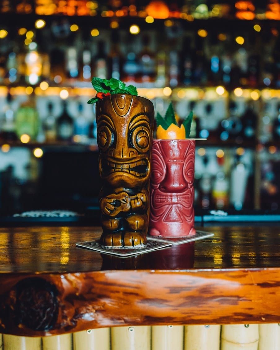 Cocktails served in tiki mugs at Pukiki