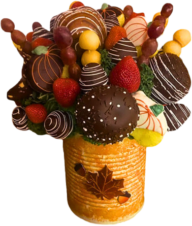 A bouquet of fruits and vegetables with a label that says eat drink scary