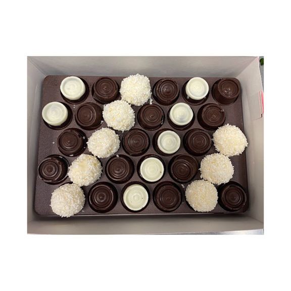 There are many different types of chocolate covered strawberries in this box.