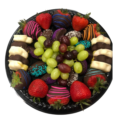 A tray of chocolate covered strawberries and grapes