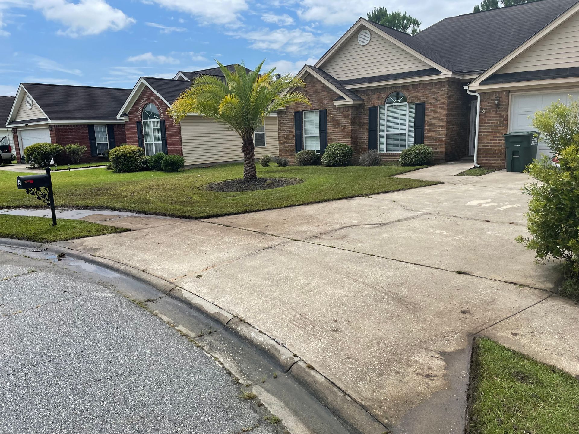 A row of houses with a mailbox in front of them