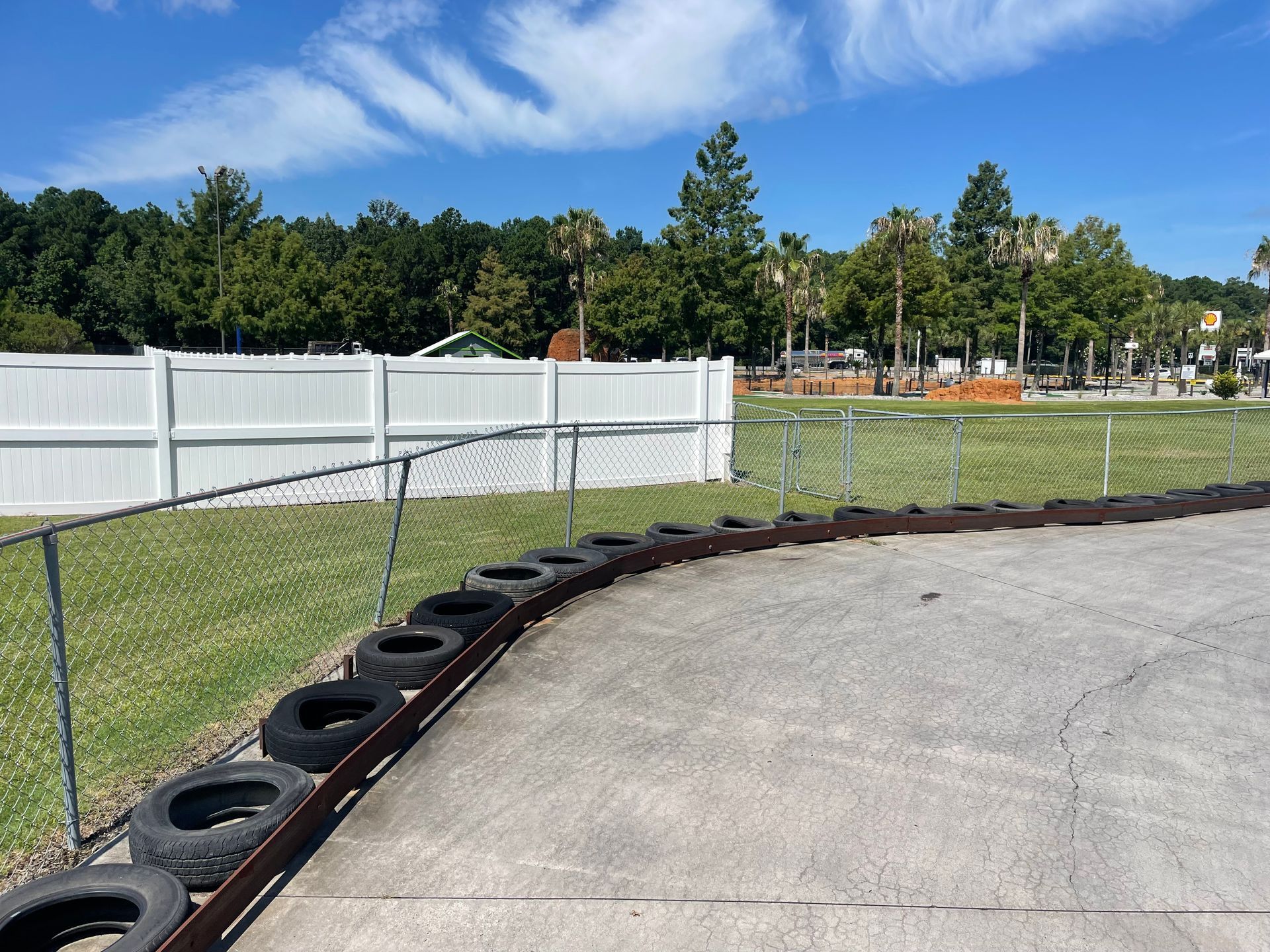 A go kart track with tires on the side of it