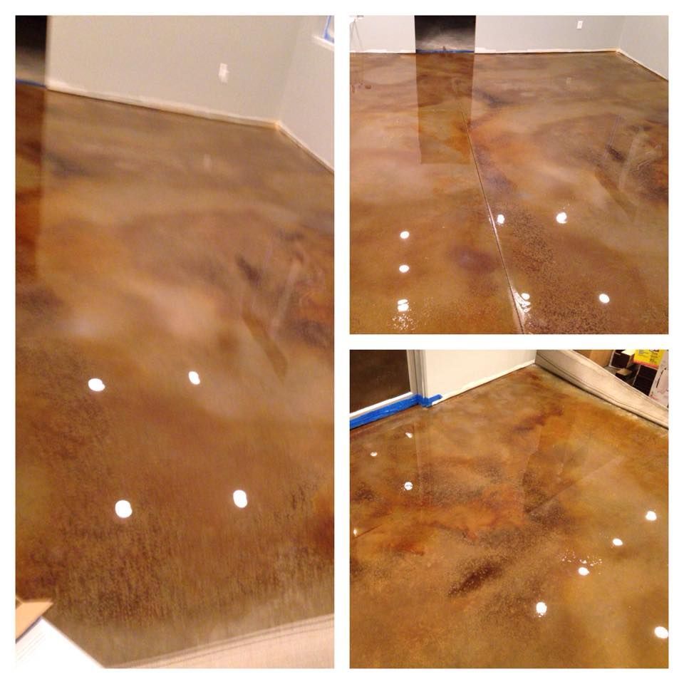 Metallic epoxy flooring in shades of brown and gold.