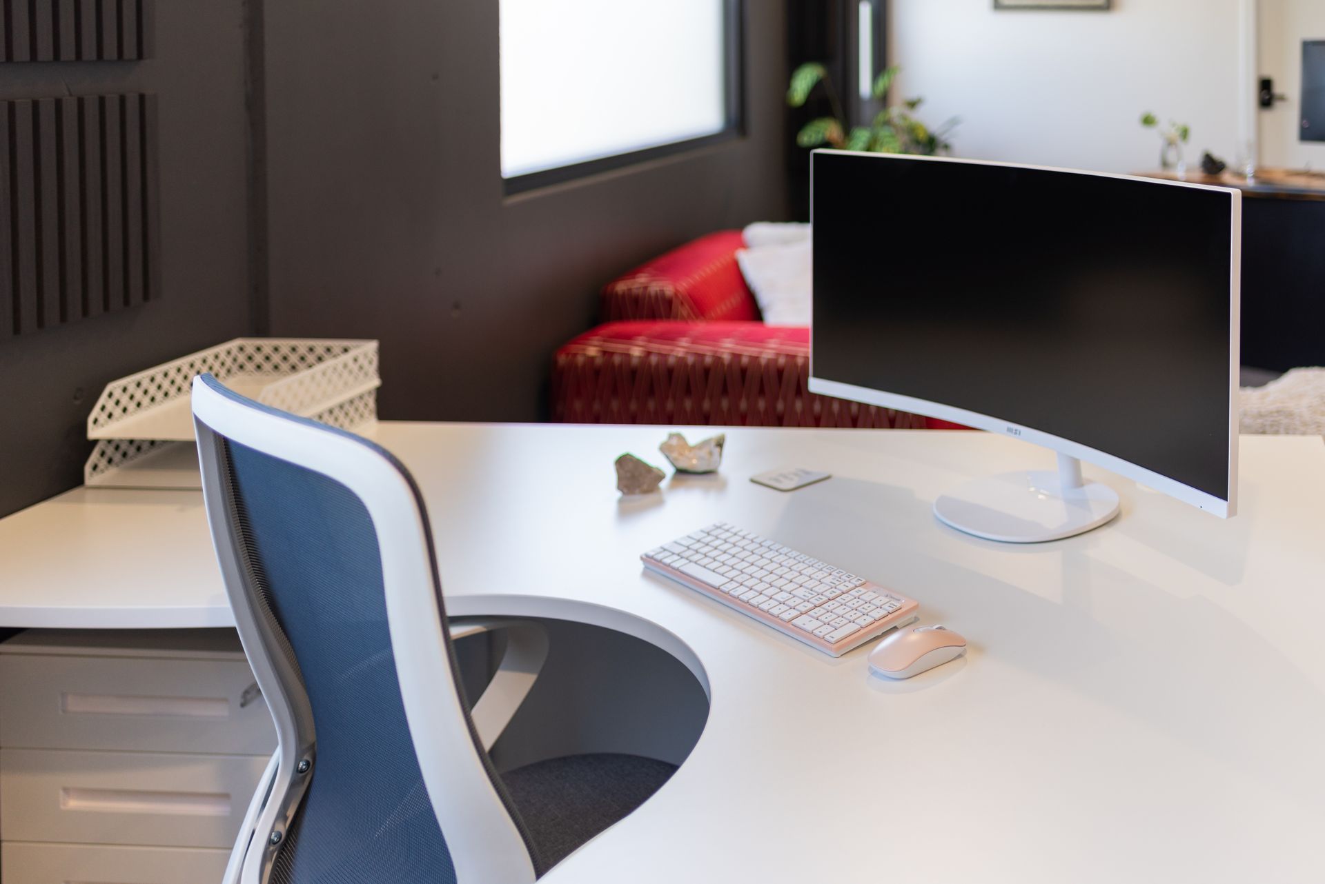 A desk with a computer , keyboard and mouse on it.