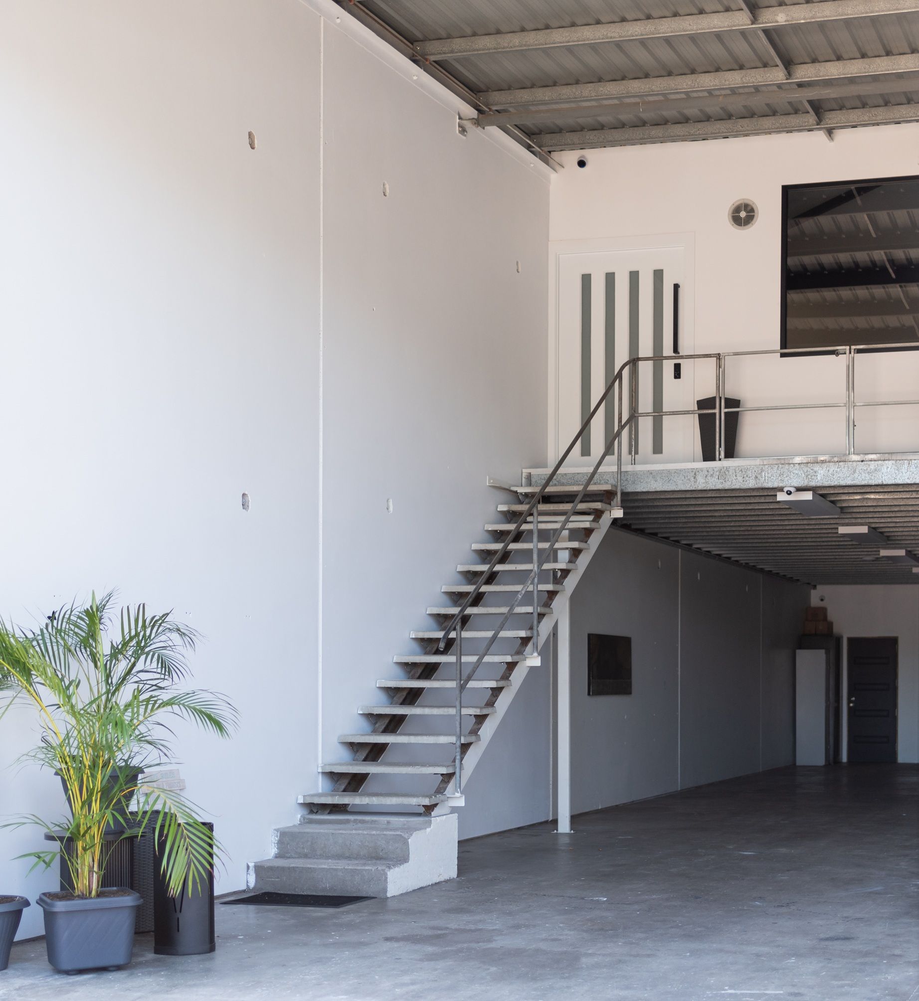 A staircase leading up to the second floor of a building