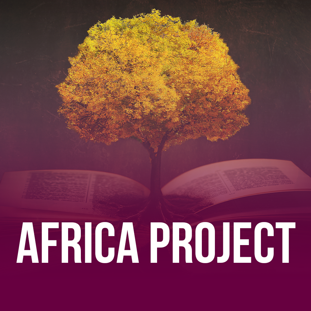 Tree growing out of an open book, with