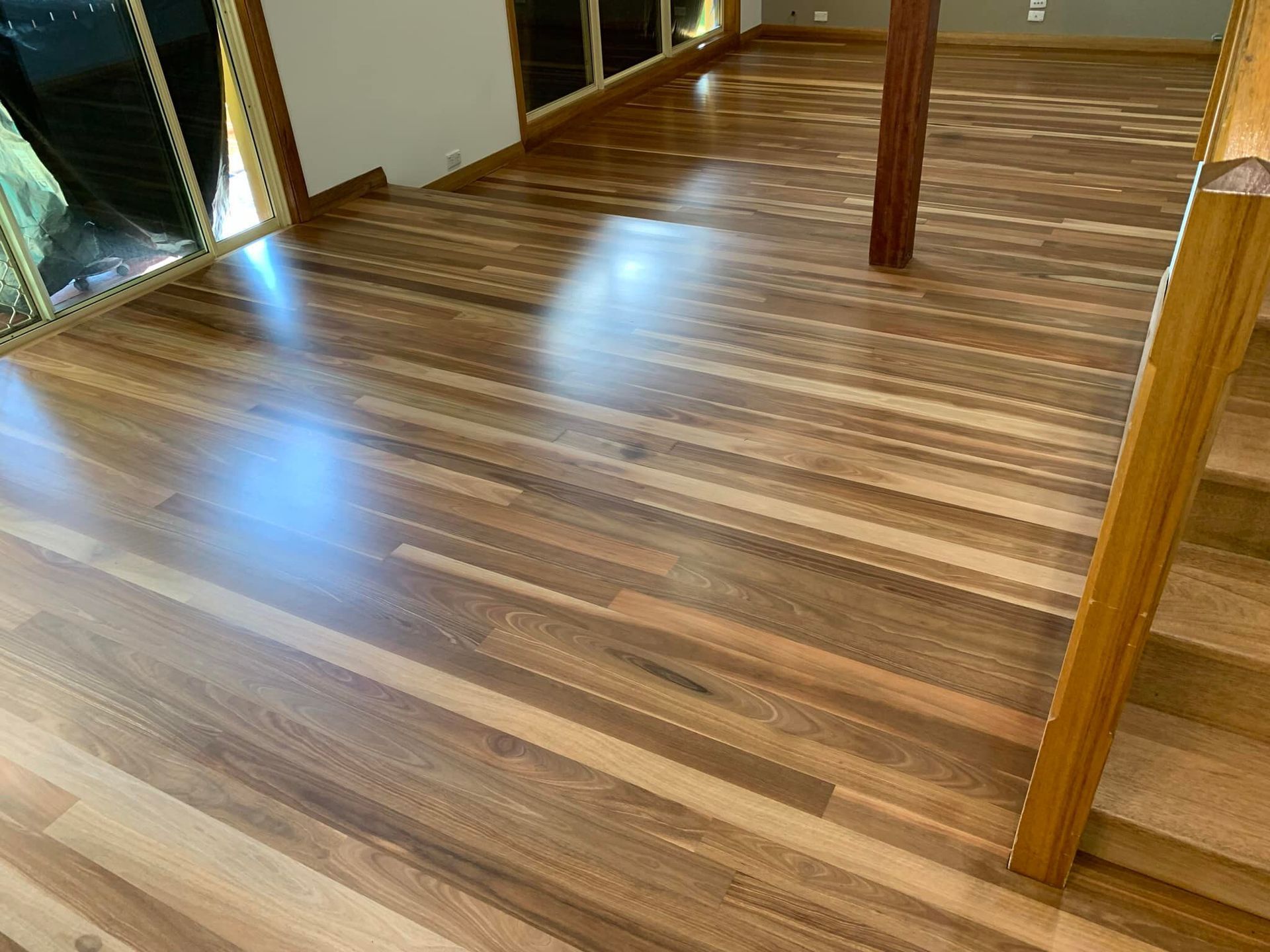Polished Wooden Floor in a Room — Custom Floor Sanding In Gosford, NSW