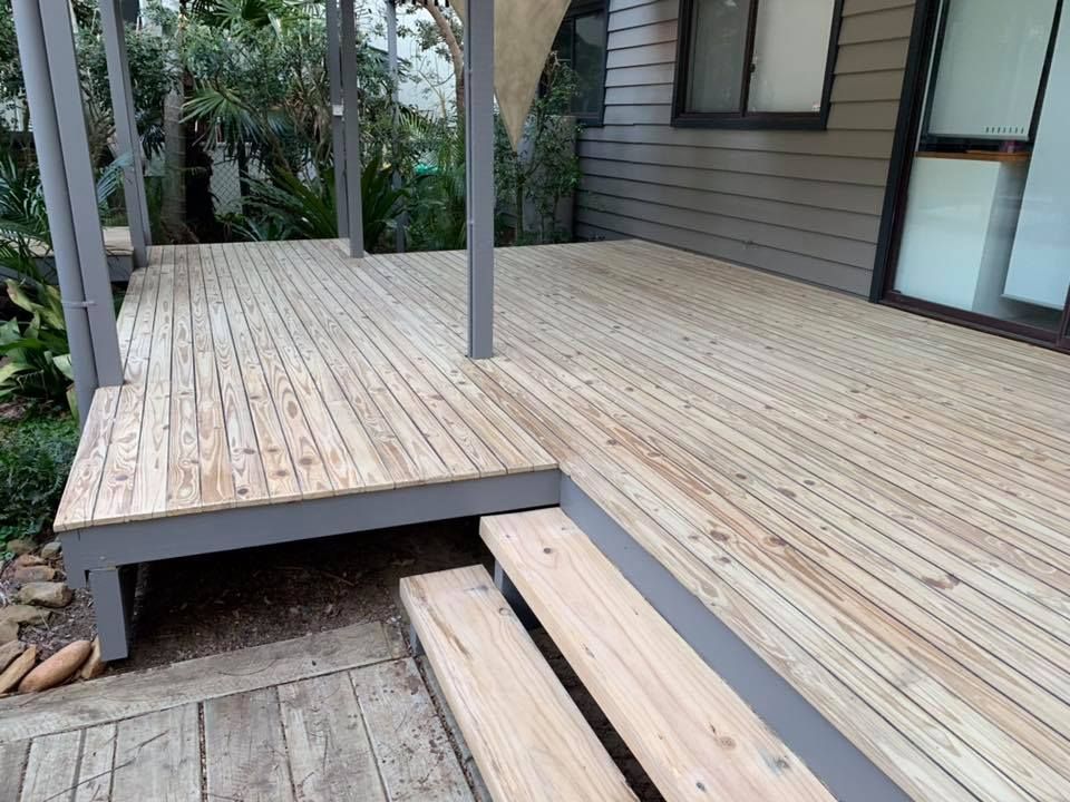 Wooden Deck With Weathered Planks and Support Beams — Custom Floor Sanding In Somersby, NSW