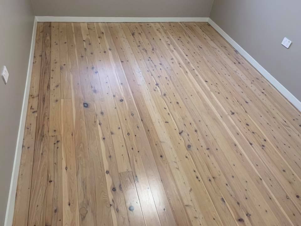 Hardwood Floor Being Sanded, With Machinery and Cords — Custom Floor Sanding In Wyong, NSW