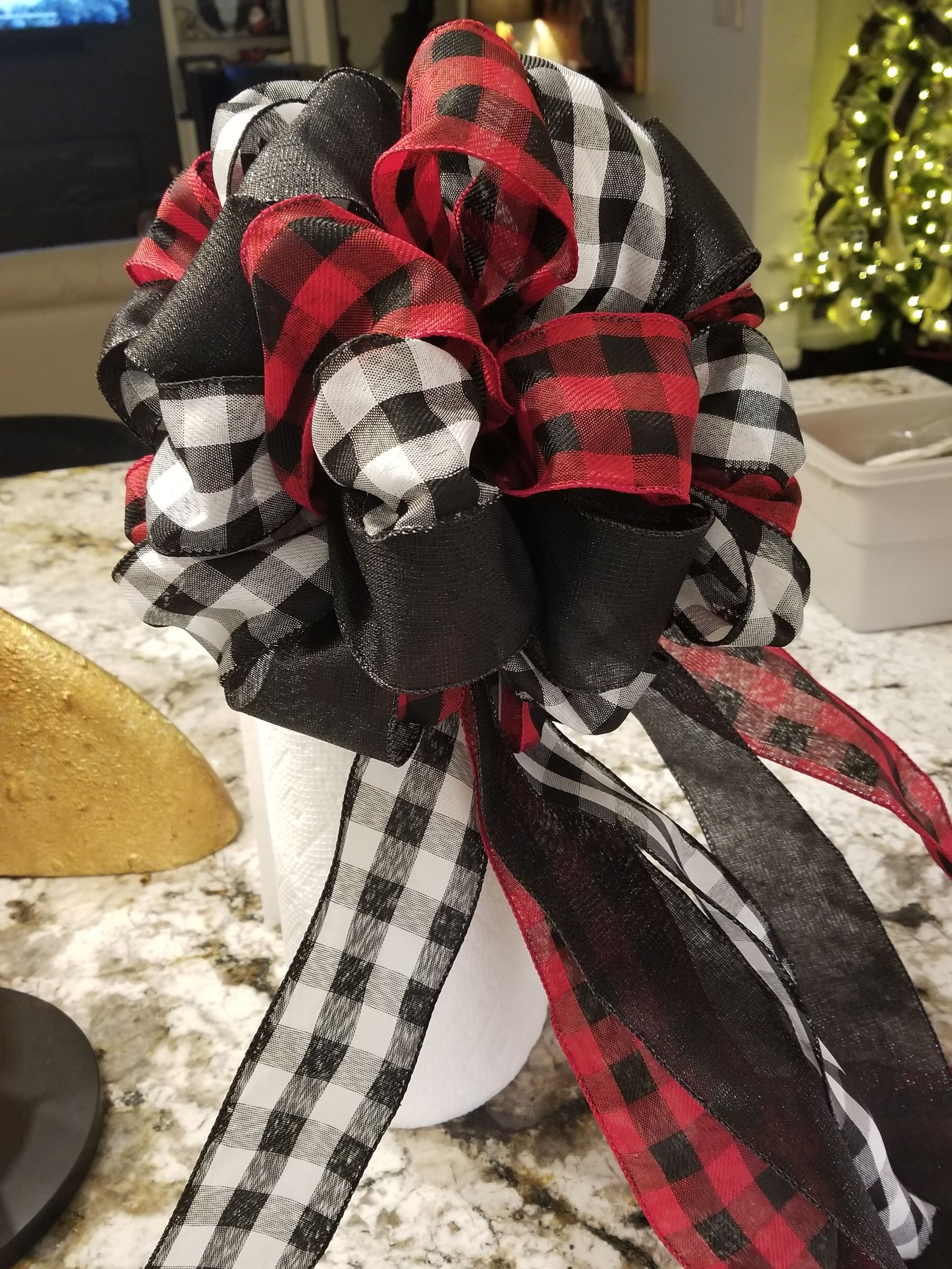 A black and red bow on a counter