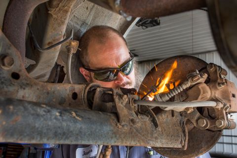 Auto Repair — Man Inspecting Auto in West Bridgewater, PA