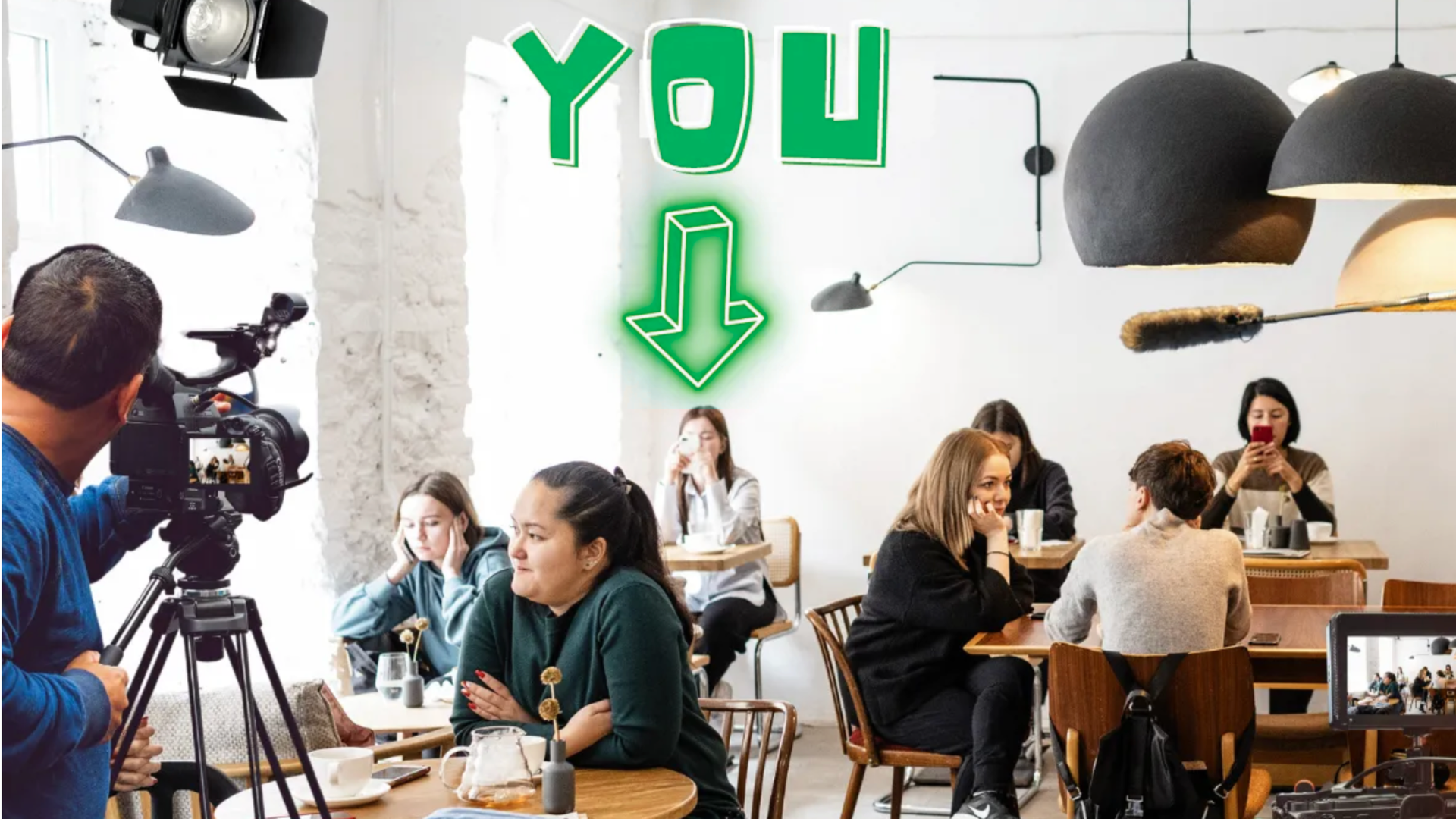 A videographer films people in a cafe, with a bright green 