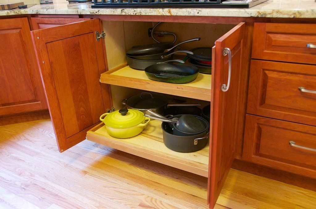Kitchen Cabinet with Utensils — Cleveland, OH — Trademark Carpentry Service