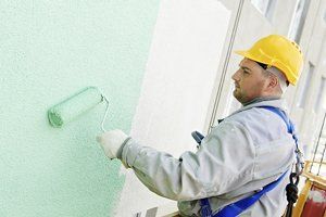 Man Painting the Wall — Cleveland, OH — Trademark Carpentry Service