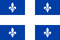 Drapeau du Québec : croix blanche sur fond bleu, avec une fleur de lys blanche dans chaque quadrant bleu.