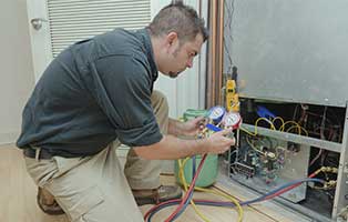 HVAC Technician Working - Commercial Air Conditioning Repair in Rumford, RI
